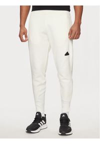 Adidas - adidas Spodnie dresowe Z.N.E. Premium IN1912 Biały Regular Fit. Kolor: biały. Materiał: bawełna