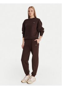 Guess Spodnie dresowe V6RB15 K9V31 Brązowy Regular Fit. Kolor: brązowy. Materiał: bawełna #3