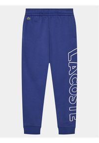 Lacoste Spodnie dresowe XJ6901 Niebieski Relaxed Fit. Kolor: niebieski. Materiał: syntetyk