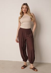 Born2be - Brązowe Baloniaste Spodnie z Wysokim Stanem w Stylu Casual Lilanya. Okazja: na co dzień. Stan: podwyższony. Kolor: brązowy. Długość: krótkie. Sezon: wiosna, lato. Styl: casual #8