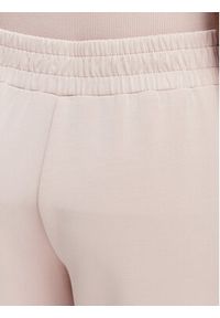 Guess Spodnie dresowe V6YB18 K4315 Różowy jasny Regular Fit. Kolor: różowy. Materiał: syntetyk #3