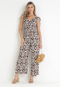 Born2be - Brązowy Wzorzysty Kombinezon z Kopertowym Dekoltem i Gumką w Pasie z Wiskozy Kathla. Kolor: brązowy. Materiał: wiskoza. Długość rękawa: bez rękawów. Długość: długie. Sezon: wiosna, lato #4