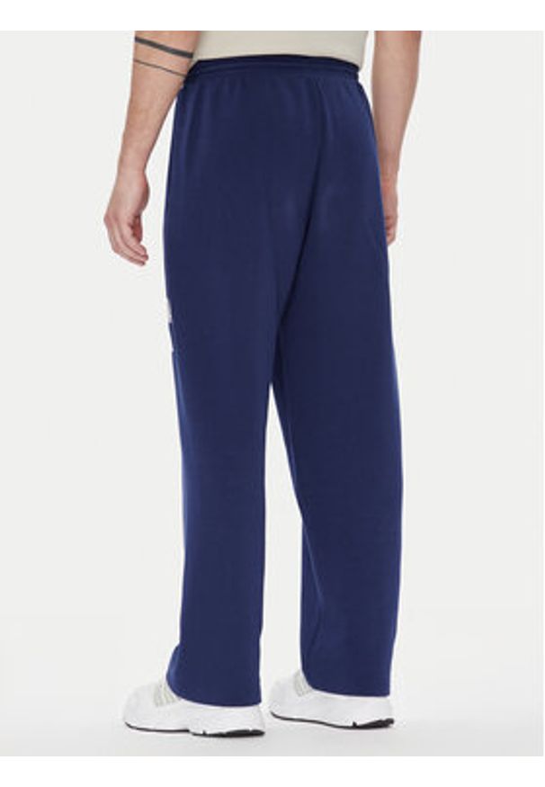 Adidas - adidas Spodnie dresowe Collegiate JM9179 Niebieski Regular Fit. Kolor: niebieski. Materiał: syntetyk