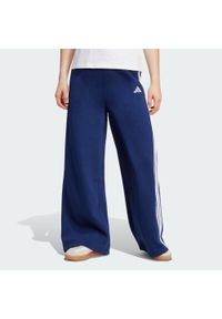 Adidas - Spodnie adidas 3-Stripes Fleece Wide. Kolor: niebieski