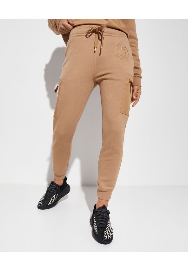 Burberry - BURBERRY - Bawełniane spodnie dresowe. Kolor: beżowy. Materiał: dresówka, bawełna. Wzór: haft