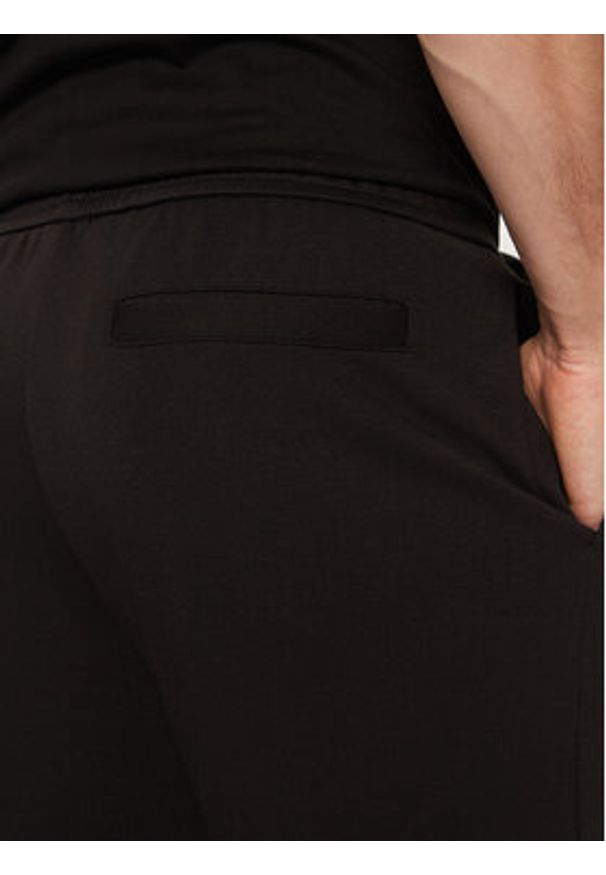 Armani Exchange Spodnie dresowe XM000333 AF12269 UC001 Czarny Regular Fit. Kolor: czarny. Materiał: syntetyk