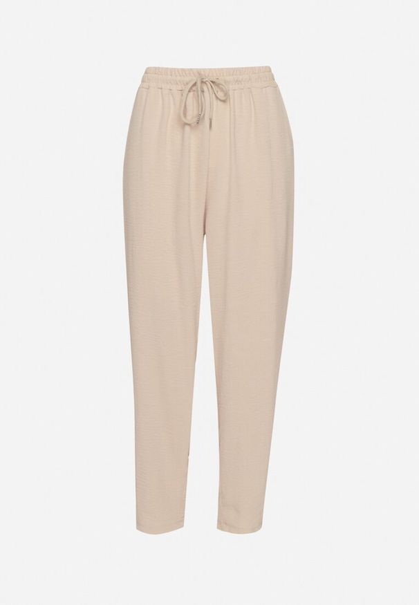 Born2be - Beżowe Spodnie Luźne z Kieszeniami i Gumką w Talii oraz Sznurkiem Enivia. Okazja: na co dzień. Kolor: beżowy. Styl: casual, elegancki