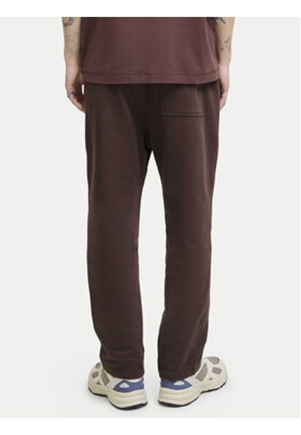 Jack & Jones Spodnie dresowe Kane Norrebro 12282553 Czerwony Relaxed Fit. Kolor: czerwony. Materiał: bawełna