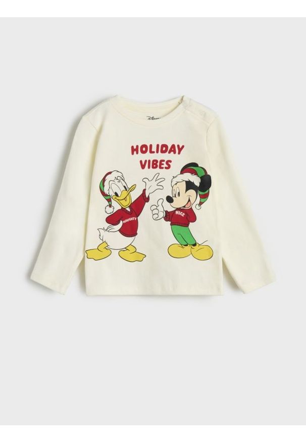 Sinsay - Koszulka z długimi rękawami Disney - kremowy. Kolor: kremowy. Długość rękawa: długi rękaw. Długość: długie. Wzór: motyw z bajki. Styl: wizytowy