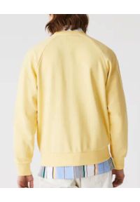 Lacoste - LACOSTE - Żółta bluza z haftowanym logo. Okazja: na co dzień. Kolor: żółty. Materiał: bawełna, polar. Długość rękawa: raglanowy rękaw. Wzór: haft. Styl: casual #5