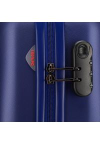 Wittchen - Średnia walizka z polikarbonu fakturowana niebieska. Kolor: niebieski. Materiał: guma. Styl: klasyczny #7