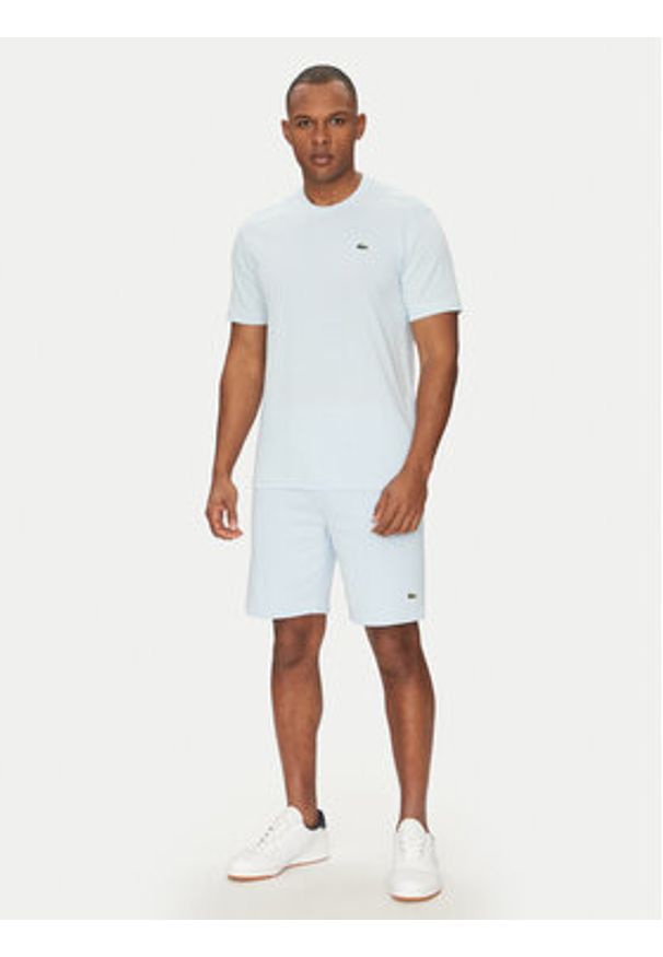 Lacoste T-Shirt TH7618 Błękitny Regular Fit. Kolor: niebieski. Materiał: bawełna, syntetyk
