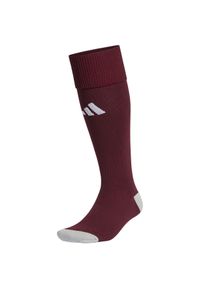 Getry piłkarskie Adidas Milano 23. Kolor: czerwony, brązowy, wielokolorowy. Sport: piłka nożna #1