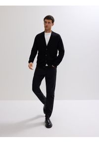 Reserved - Kardigan z wełny merino - czarny. Kolor: czarny. Materiał: wełna