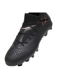 Buty piłkarskie Puma Future 7 Pro FG/AG Jr 107728 02 czarne. Kolor: czarny. Materiał: dzianina. Szerokość cholewki: normalna. Sport: piłka nożna