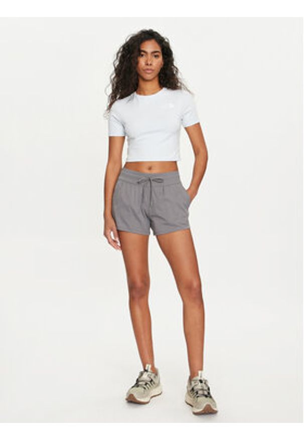 The North Face T-Shirt NF0A55AO Błękitny Cropped Fit. Kolor: niebieski. Materiał: bawełna