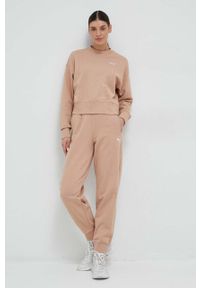 Puma spodnie dresowe kolor beżowy gładkie. Stan: podwyższony. Kolor: beżowy. Materiał: dresówka. Wzór: gładki #5