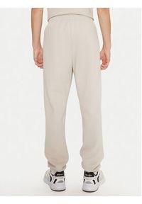 Champion Spodnie dresowe 220424 Écru Regular Fit. Materiał: syntetyk #3