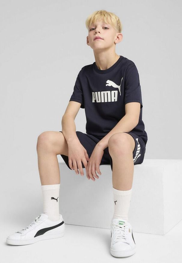 Puma - Młodzieżowa koszulka ESS z logo No. 1 PUMA New Navy Blue. Kolor: niebieski. Materiał: guma. Wzór: nadruk