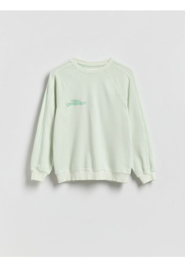 Reserved - Bluza oversize z efektem sprania - jasnoturkusowy. Kolor: turkusowy. Materiał: dzianina, bawełna