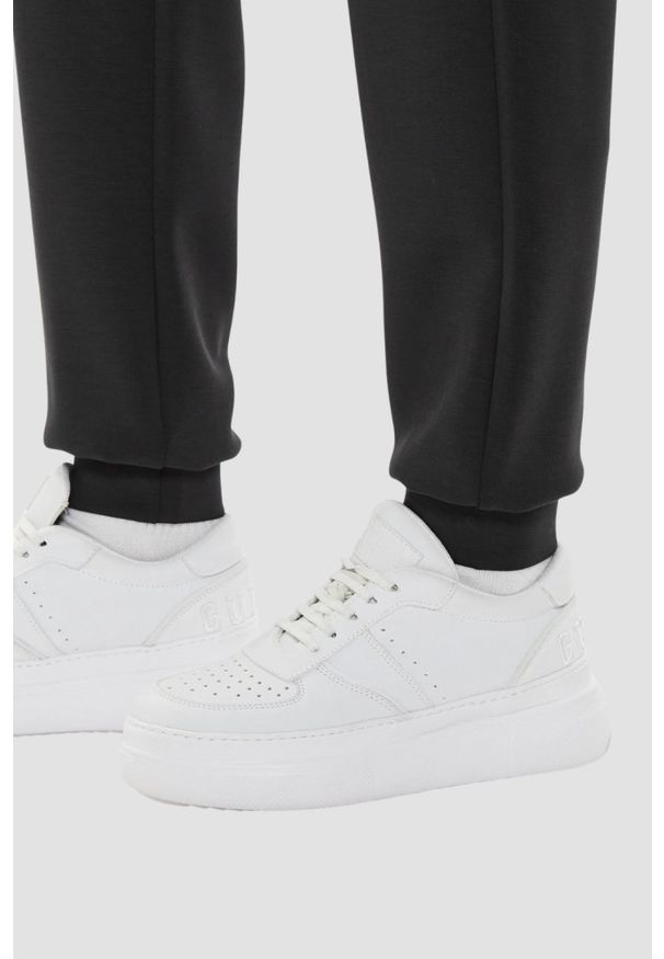 Guess - GUESS Czarne damskie spodnie dresowe Olympe, Rozmiar S. Kolor: czarny. Materiał: dresówka