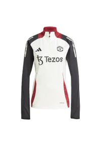 Adidas - Bluza Manchester United Tiro 24 Training. Kolor: czarny, biały, wielokolorowy. Materiał: materiał. Sport: piłka nożna