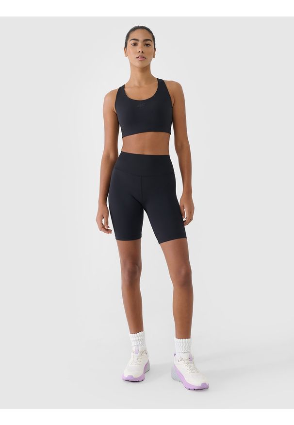 4f - 4F Legginsy kolarki treningowe damskie - czarne M. Kolor: czarny. Materiał: dzianina, włókno, poliester, materiał, elastan. Wzór: gładki, ze splotem, jednolity. Sport: fitness
