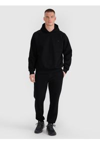 4f - 4F Spodnie dresowe joggery uniseks - czarne XS. Kolor: czarny. Materiał: dresówka. Wzór: ze splotem, gładki #1