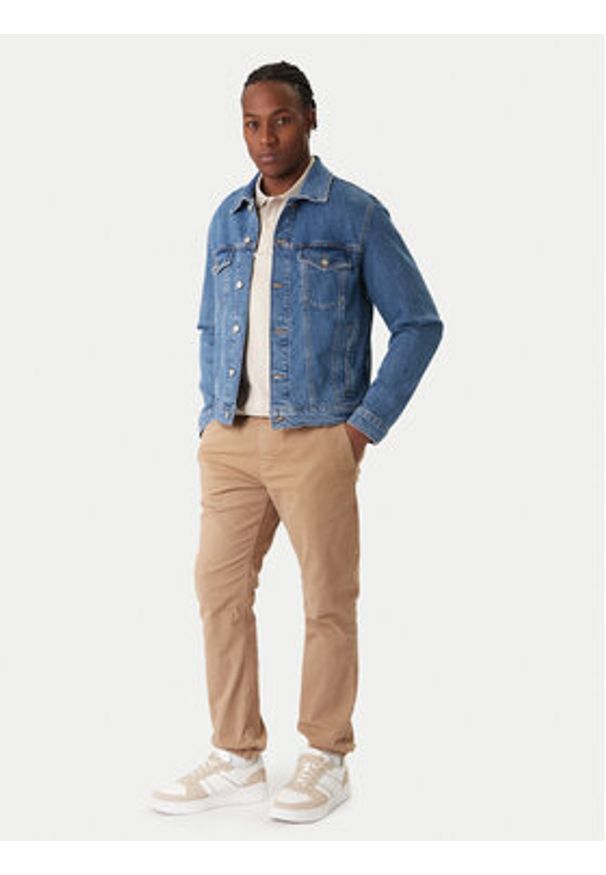 Tommy Jeans Kurtka jeansowa DM0DM22635 Niebieski Regular Fit. Kolor: niebieski. Materiał: bawełna