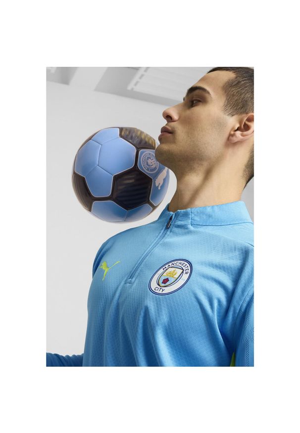 Puma - Męska bluza treningowa Manchester City z zamkiem 1/4 PUMA Magic Blue Yellow Glow. Kolor: niebieski, żółty, wielokolorowy. Sport: piłka nożna