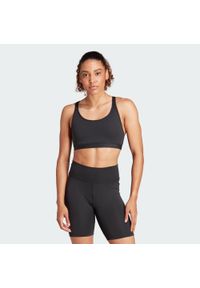 Adidas - Biustonosz All Me Essentials Medium-Support. Kolor: czarny. Materiał: materiał. Sport: joga i pilates