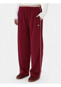 Tommy Jeans Spodnie dresowe Archive DW0DW22633 Bordowy Regular Fit. Kolor: czerwony. Materiał: syntetyk #1
