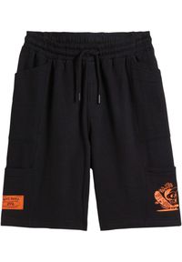 bonprix - Bermudy dresowe chłopięce z bawełny organicznej. Kolor: czarny. Materiał: bawełna, dresówka #1