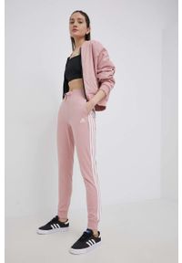 Adidas - adidas spodnie HD4272 damskie kolor różowy z aplikacją. Stan: podwyższony. Kolor: różowy. Materiał: bawełna, materiał, dzianina. Wzór: aplikacja #4