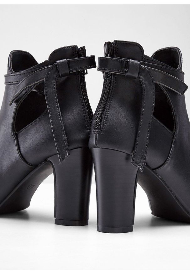 bonprix - Krótkie botki z wycięciami. Kolor: czarny. Szerokość cholewki: normalna. Obcas: na obcasie. Wysokość obcasa: średni