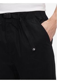 Converse Spodnie dresowe Elevated Woven Jogger 10024604-A01 Czarny Regular Fit. Kolor: czarny. Materiał: bawełna