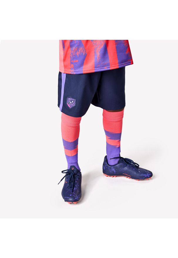 KIPSTA - Spodenki piłkarskie dla dzieci Kipsta Viralto Kids. Kolor: niebieski, wielokolorowy, fioletowy. Materiał: poliester, materiał. Sezon: lato. Styl: sportowy