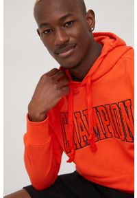 Champion bluza męska kolor pomarańczowy z kapturem z aplikacją. Typ kołnierza: kaptur. Kolor: pomarańczowy. Materiał: włókno. Wzór: aplikacja