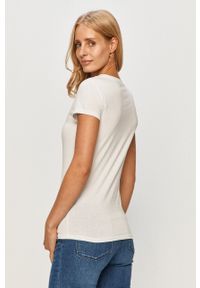 Armani Exchange - T-shirt. Okazja: na co dzień. Kolor: biały. Materiał: dzianina. Wzór: aplikacja. Styl: casual