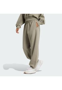Adidas - Spodnie ALL SZN Soft Lux Loose. Kolor: szary