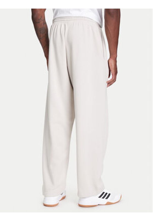 Adidas - adidas Spodnie dresowe Collegiate JM9177 Beżowy Regular Fit. Kolor: beżowy. Materiał: syntetyk, bawełna