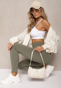 Renee - Ciemnozielone Legginsy z Gumką w Talii z Długimi Nogawkami Caleta. Okazja: na co dzień. Kolor: zielony. Długość: długie. Styl: klasyczny, casual