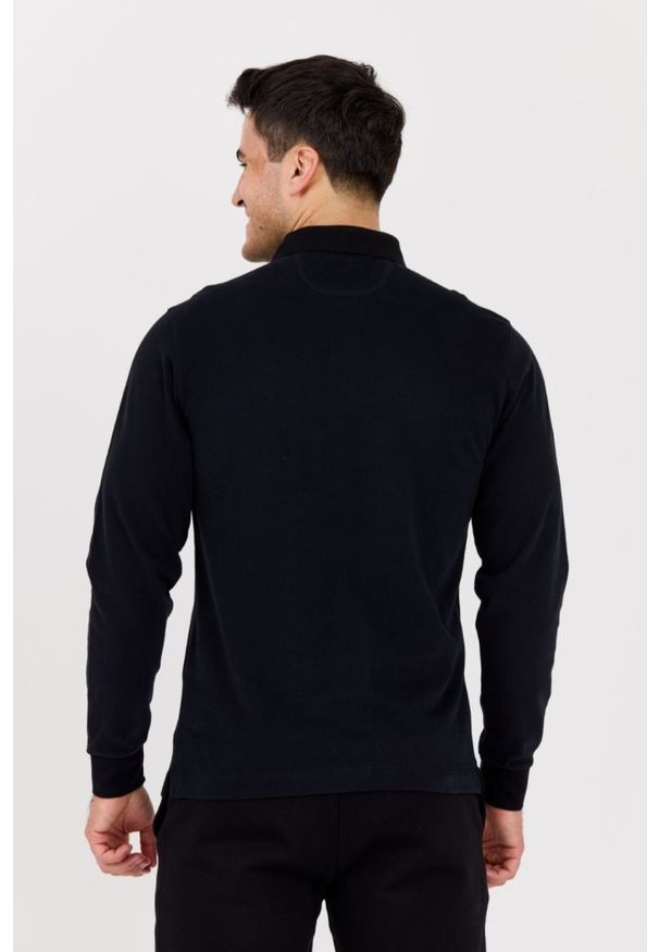 La Martina - LA MARTINA Czarny męski longsleeve polo HEAVY JERSEY. Typ kołnierza: polo. Kolor: czarny. Materiał: jersey. Długość rękawa: długi rękaw. Długość: długie. Styl: klasyczny