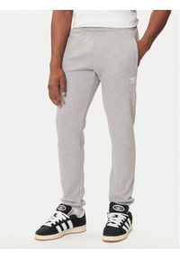 Adidas - adidas Spodnie dresowe Trefoil Essentials JY6271 Szary Slim Fit. Kolor: szary. Materiał: bawełna #1