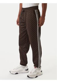 Guess Spodnie dresowe Z5BB19 K2042 Czarny Regular Fit. Kolor: czarny. Materiał: syntetyk #1