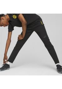Puma - Spodnie dresowe Borussia Dortmund 2022/23. Kolor: czarny. Materiał: dresówka. Sport: piłka nożna