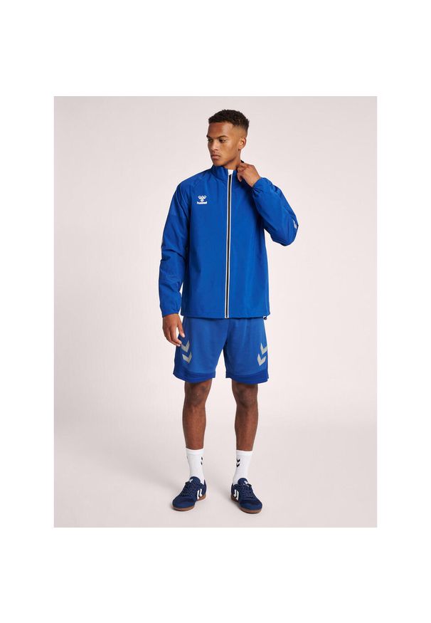 Kurtka Hummel hmlLEAD training. Kolor: niebieski. Sport: piłka ręczna