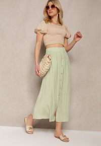 Renee - Jasnozielona Rozkloszowana Spódnica Maxi z Gumką w Talii i Kieszeniami Kendrani. Okazja: na co dzień, na imprezę. Kolor: zielony. Styl: casual, elegancki
