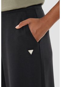 Guess - GUESS Czarne damskie spodnie dresowe Olympe Wide Leg, Rozmiar S. Kolor: czarny. Materiał: dresówka #2