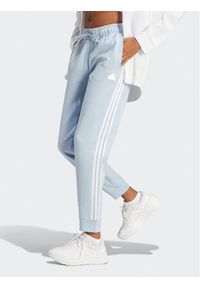 Adidas - adidas Spodnie dresowe Future Icons 3-Stripes IM2545 Błękitny Regular Fit. Kolor: niebieski. Materiał: bawełna #1